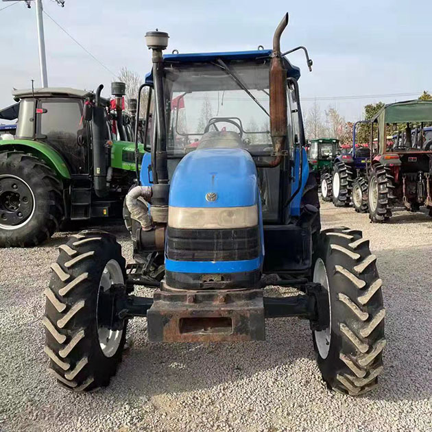Nuevo tractor Holland SNH904 4WD usado.